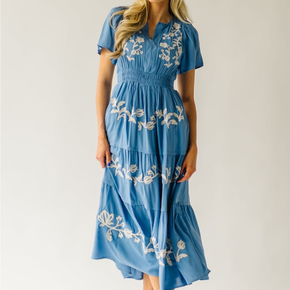 The Radford embroidered maxi dress and blue piper and scoot